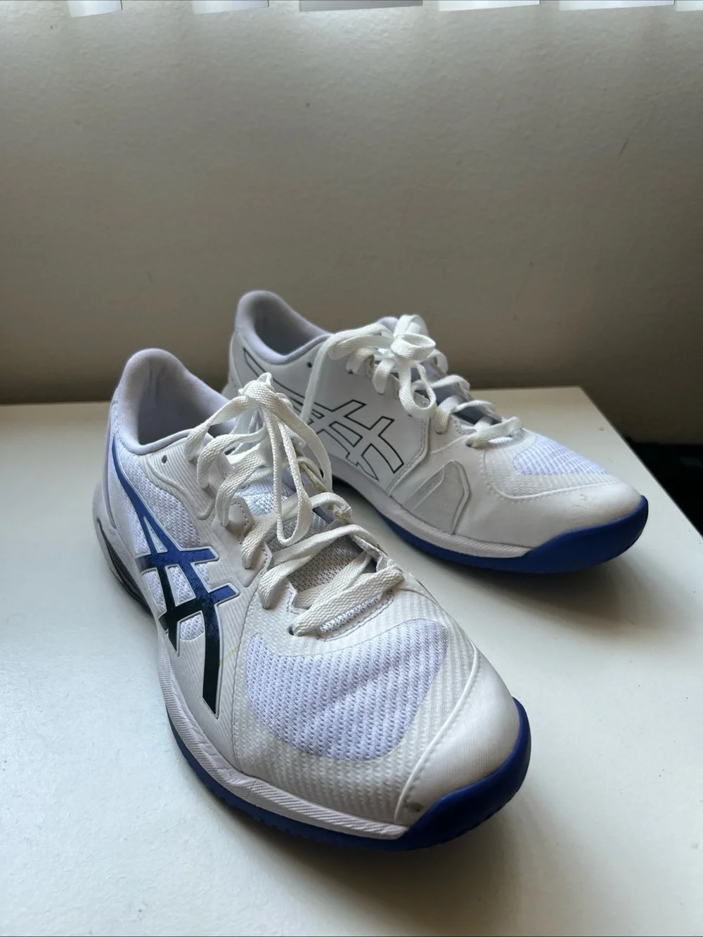 ASICS White Athletic Running Shoes with Blue and Black Accents